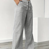 Alina - Elegáns Csíkos Nadrág Zsebekkel